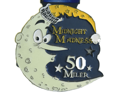 TATUR Midnight Madness 50 Miler logo on RaceRaves