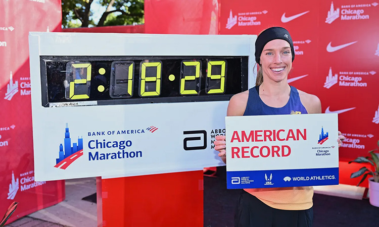 Emily Sisson celebrates her new American marathon record time at the 2022 Bank of America Chicago Marathon