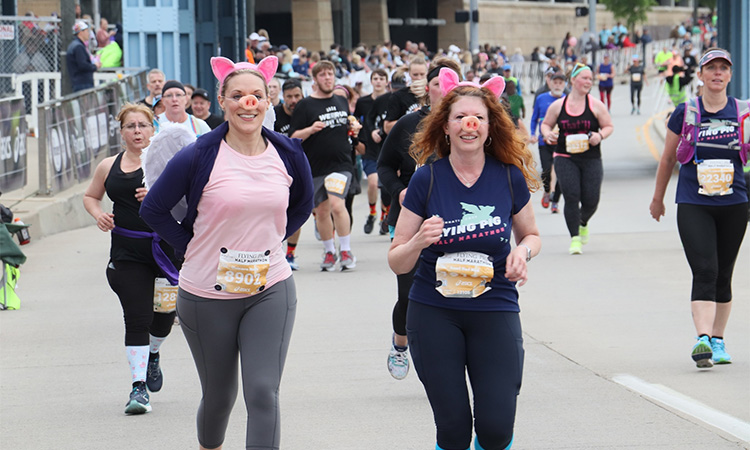 Runners in costume at the Cincinnati Flying Pig Marathon
