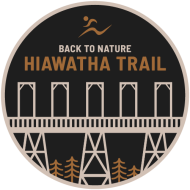 Fall Back Into Hiawatha Trail Run logo on RaceRaves