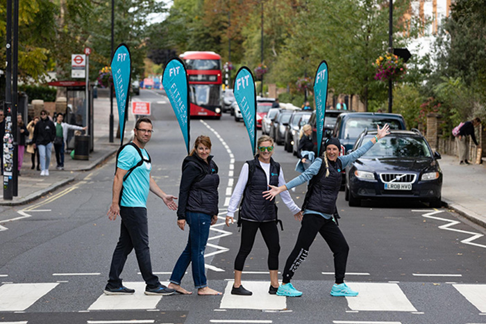 The Fitness International Travel team crosses Abbey Road in London