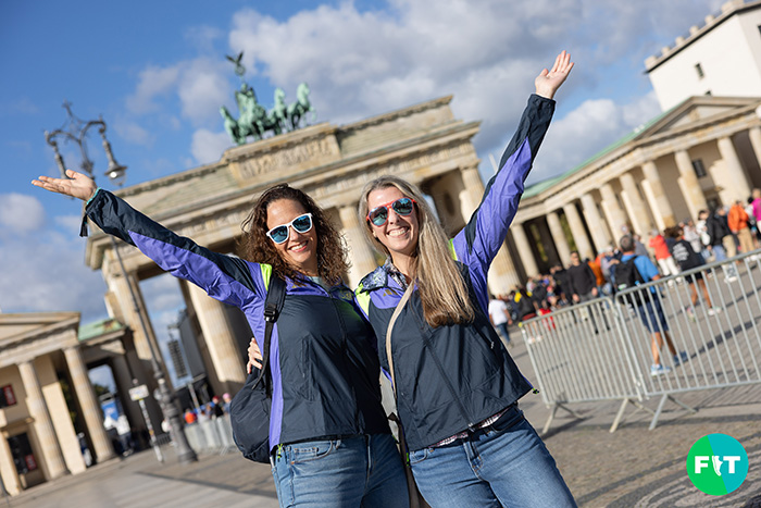 Fitness International Travel team members pose in front of the Brandenburg Gate