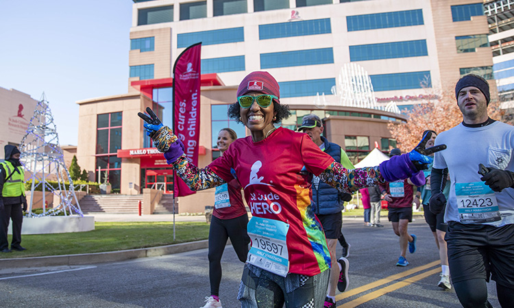 Happy runner participates as a St. Jude Hero at the St. Jude Memphis Marathon