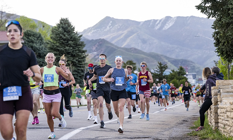 Runners with the Wasatch Mountains in the background at the Salt Lake City Marathon